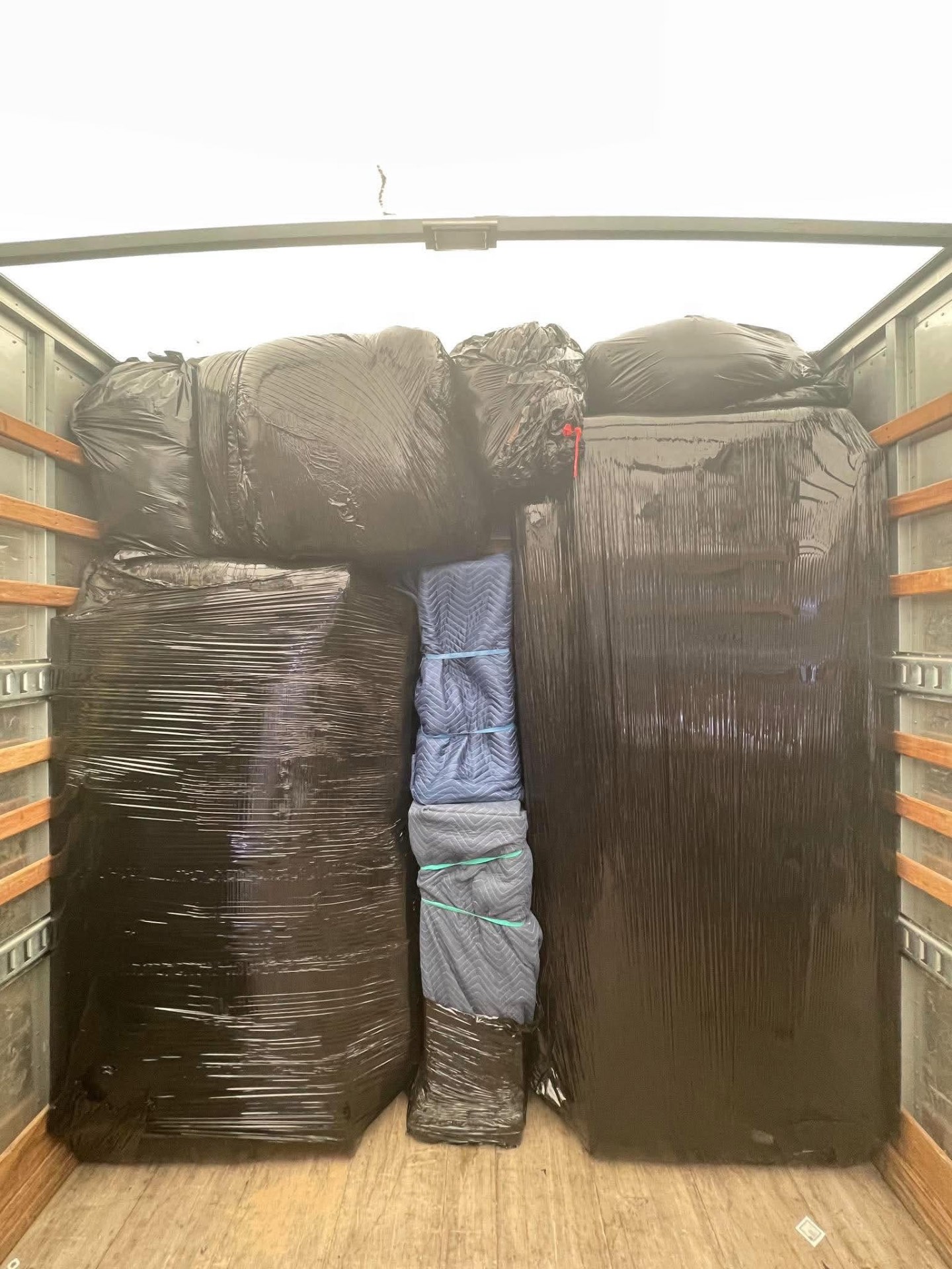 Apex Moving LLC truck loaded for a move